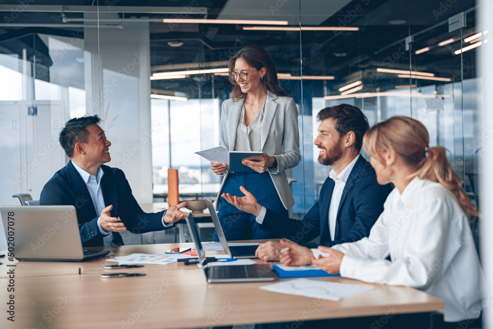 A group of business people partners during a set team meeting in the modern office.High quality